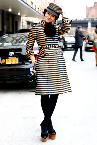 Miroslava Duma was equal parts dapper and cool in a striped trench and top hat.
Miroslava Duma was equal parts dapper and cool in a striped trench and top hat.