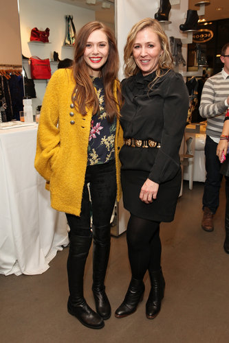 Elizabeth Olsen met up with Cher Coulter at the AG Cher Coulter bash held at NYC's Scoop on Thursday.
Elizabeth Olsen met up with Cher Coulter at the AG Cher Coulter bash held at NYC's Scoop on Thursday.