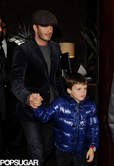 Cruz held on to dad David Beckham Friday night in London.
Cruz held on to dad David Beckham Friday night in London.
