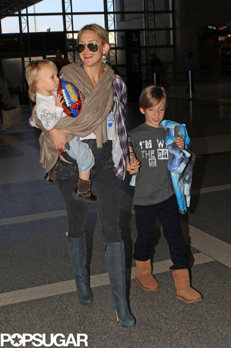 Kate Hudson Flies the Smiley Skies With Ryder and Bingham Kate Hudson Flies the Smiley Skies With Ryder and Bingham