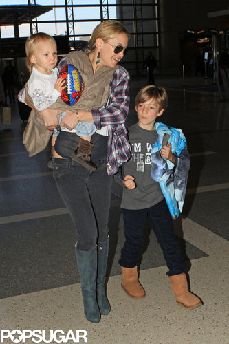Kate Hudson Flies the Smiley Skies With Ryder and Bingham Kate Hudson Flies the Smiley Skies With Ryder and Bingham