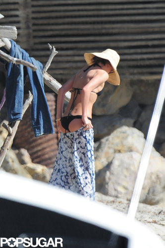 Miranda Kerr slipped into a black bikini for a beach day with her family in LA.
Miranda Kerr slipped into a black bikini for a beach day with her family in LA.
