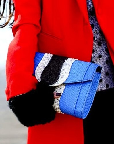 Statement blue clutch and red coat add up to the perfect Winter pairing.
Statement blue clutch and red coat add up to the perfect Winter pairing.