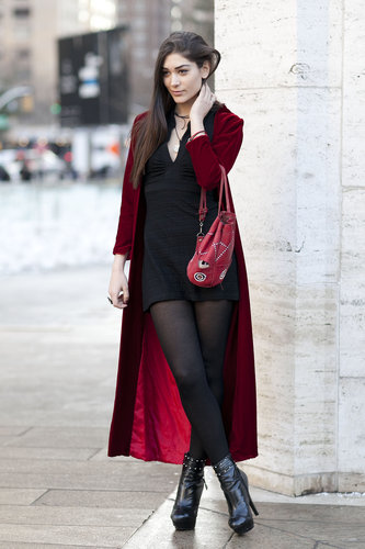 A maroon coat lent a moodier feel to a black mini and tights.
A maroon coat lent a moodier feel to a black mini and tights.