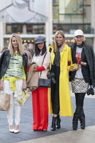 The mod quad — brights, prints, statement coats, and killer footwear. What more could you ask for in a Fashion Week clique?
The mod quad — brights, prints, statement coats, and killer footwear. What more could you ask for in a Fashion Week clique?