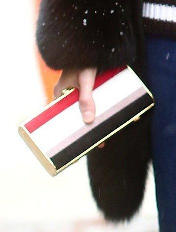 We love the bold colorblock detail and luxe gold trim on this structured clutch.
We love the bold colorblock detail and luxe gold trim on this structured clutch.