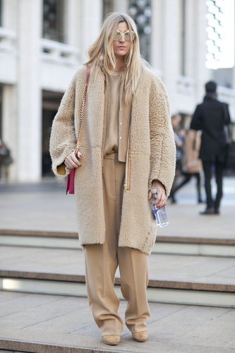 Monochromatic-cool with ample texture thanks to a fuzzy cocoon coat.
Monochromatic-cool with ample texture thanks to a fuzzy cocoon coat.
