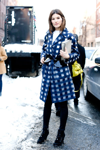 Hanneli Mustaparta made her outerwear count in an attention-grabbing checked coat.
Hanneli Mustaparta made her outerwear count in an attention-grabbing checked coat.