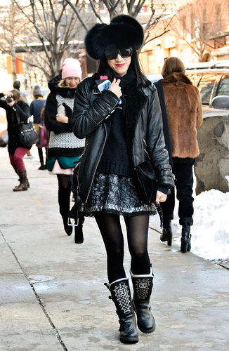 Bold texture and statement boots helped load this black-on-black ensemble with personality.
Bold texture and statement boots helped load this black-on-black ensemble with personality.