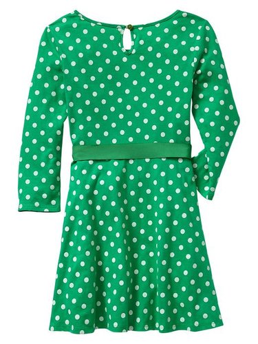 Pair this green polka-dot dress ($27) with shiny gold accents for sweet Mardi Gras style.
Pair this green polka-dot dress ($27) with shiny gold accents for sweet Mardi Gras style.