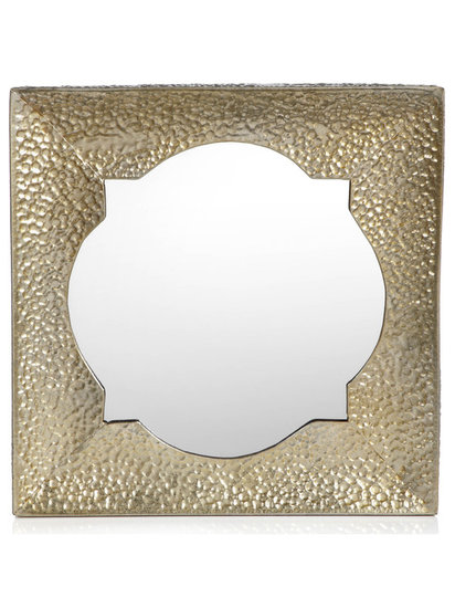You won't have trouble finding a place off the runway for this lovely textured gold mirror ($50).
You won't have trouble finding a place off the runway for this lovely textured gold mirror ($50).