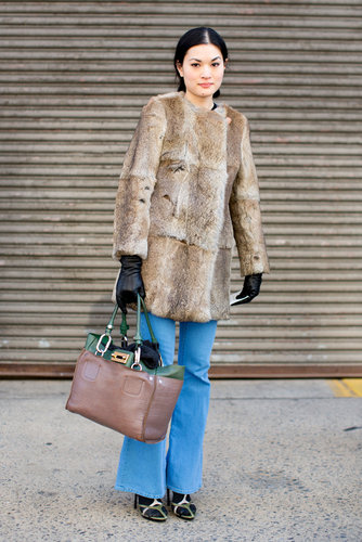 A fur coat transformed her flared denim with serious sophistication.
A fur coat transformed her flared denim with serious sophistication.