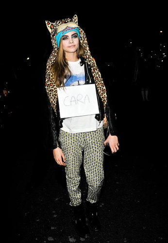 Cara Delevingne showed off her quirky head gear outside the Marc Jacobs show.
Cara Delevingne showed off her quirky head gear outside the Marc Jacobs show.