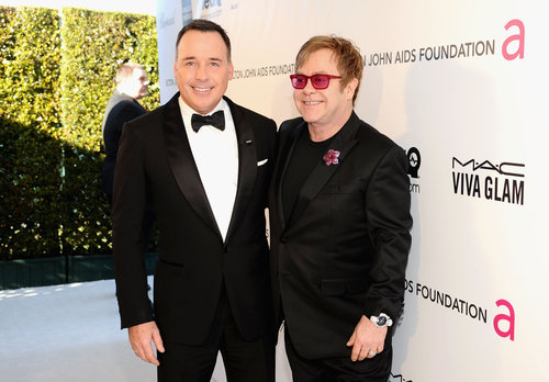 Hosts Elton John and David Furnish smiled at their Oscar party in LA.
Hosts Elton John and David Furnish smiled at their Oscar party in LA.