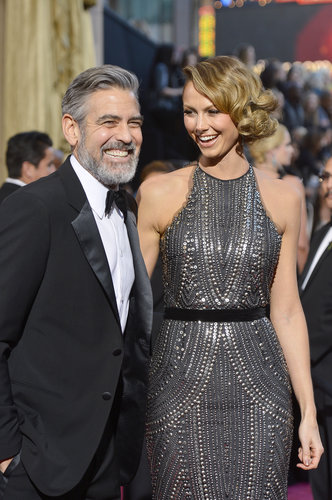 Stacy Keibler and George Clooney focused on having a laugh.
Stacy Keibler and George Clooney focused on having a laugh.