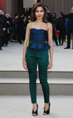 Freida Pinto wore jewel-colored tones to Burberry Prorsum's Autumn/Winter 2013 fashion show on Monday.
Freida Pinto wore jewel-colored tones to Burberry Prorsum's Autumn/Winter 2013 fashion show on Monday.