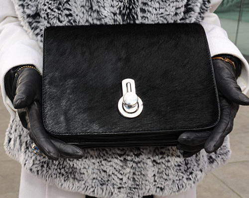 Nothing says glamorous like a textural calf-hair bag.
Nothing says glamorous like a textural calf-hair bag.
