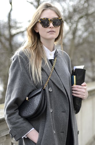 Tortoise sunglasses and a chain-strap bag added interest to a wintry palette.
Tortoise sunglasses and a chain-strap bag added interest to a wintry palette.