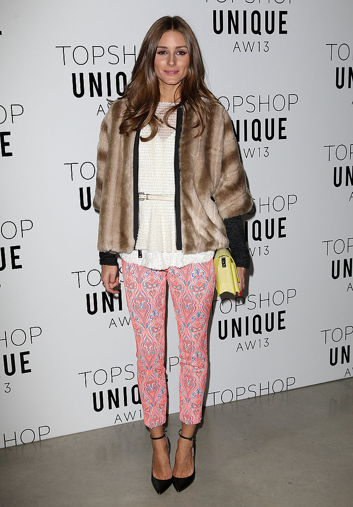 At the Unique Topshop show in London, Olivia brightened her ombré coat with punchy paisley Topshop pants and a yellow clutch.
At the Unique Topshop show in London, Olivia brightened her ombré coat with punchy paisley Topshop pants and a yellow clutch.