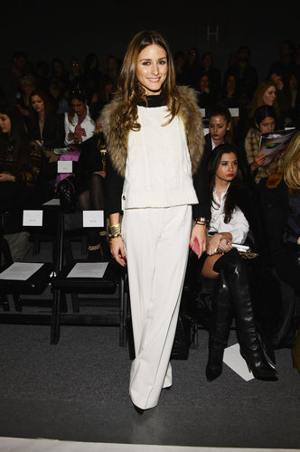 We love how Olivia's furru vest lent a touch of texture to her colorblocked top and slick white trousers at the Rachel Zoe show in NYC.
We love how Olivia's furru vest lent a touch of texture to her colorblocked top and slick white trousers at the Rachel Zoe show in NYC.
