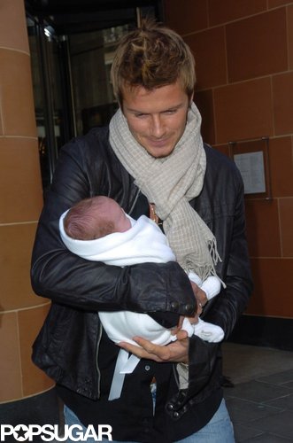 David Beckham carried newborn Cruz after lunch in London in February 2005.
David Beckham carried newborn Cruz after lunch in London in February 2005.