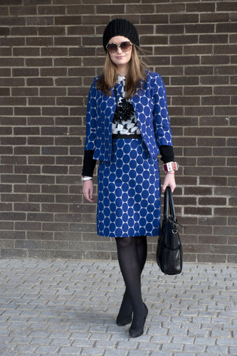 Bold polka dots got this attendee's ladylike suiting noticed outside the shows.
Bold polka dots got this attendee's ladylike suiting noticed outside the shows.
