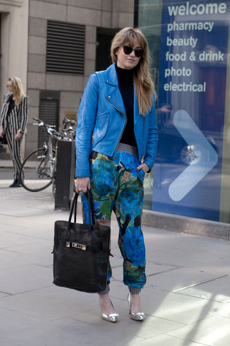 Bold blue hues on this show-goer's jacket and Christoper Kane printed pants made this look a can't-miss standout.
Bold blue hues on this show-goer's jacket and Christoper Kane printed pants made this look a can't-miss standout.