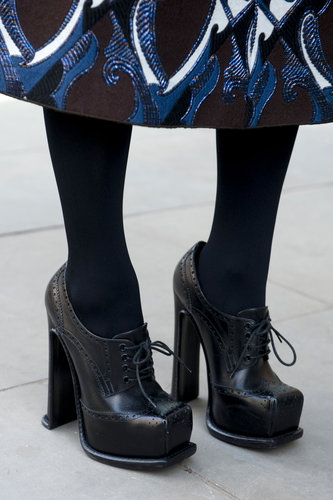 Stacked loafers added a schoolgirl charm to a printed skirt.
Stacked loafers added a schoolgirl charm to a printed skirt.