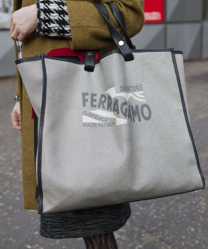 A Ferragamo carryall holds all of this Fashion Week attendee's necessities in one chic spot.
A Ferragamo carryall holds all of this Fashion Week attendee's necessities in one chic spot.