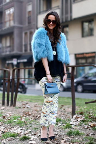 Another testament to the whimsy of Milan street chic with a furry blue chubby and printed pants.
Another testament to the whimsy of Milan street chic with a furry blue chubby and printed pants.