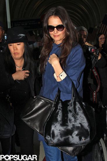 Katie Holmes was accompanied by her stylist and friend Jeanne Yang on Wednesday at LAX.
Katie Holmes was accompanied by her stylist and friend Jeanne Yang on Wednesday at LAX.