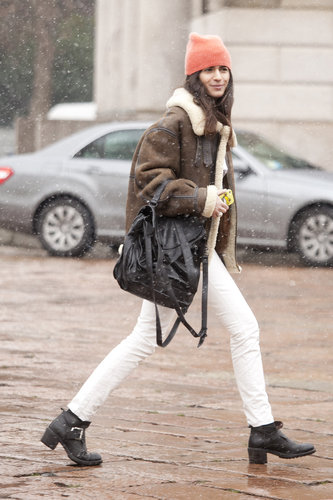 This showgoer worked a modern nod to grunge in a beanie, oversize jacket, and biker boots — but added luxe with a Proenza Schouler satchel in hand.
This showgoer worked a modern nod to grunge in a beanie, oversize jacket, and biker boots — but added luxe with a Proenza Schouler satchel in hand.