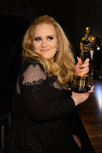 Adele clung to her award at the Governors Ball.
Adele clung to her award at the Governors Ball.
