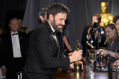 Ben Affleck took a good look at his Oscar during the Governors Ball.
Ben Affleck took a good look at his Oscar during the Governors Ball.