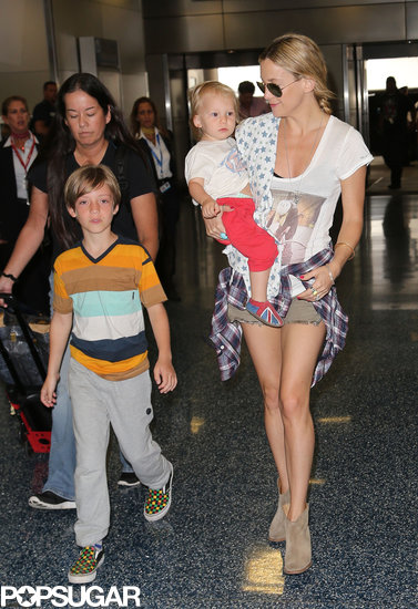 Kate Hudson wore shades as she made her way through the airport with her sons on Wednesday.
Kate Hudson wore shades as she made her way through the airport with her sons on Wednesday.