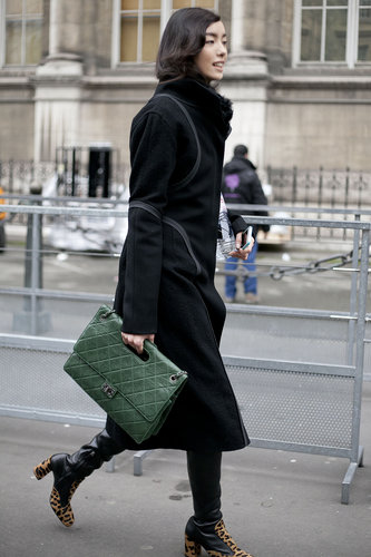 In this look, it was the accessories that made it — from the quilted emerald-green clutch to the leopard-print boots.
In this look, it was the accessories that made it — from the quilted emerald-green clutch to the leopard-print boots.