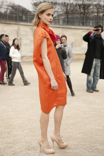 Leigh Lezark turned heads in a tangerine-hued sheath.
Leigh Lezark turned heads in a tangerine-hued sheath.