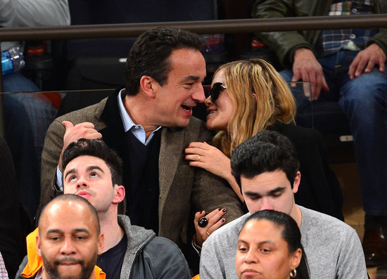 Mary-Kate Olsen snuggled with boyfriend Olivier Sarkozy. Mary-Kate Olsen snuggled with boyfriend Olivier Sarkozy.
