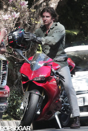 Bradley Cooper hopped onto a new motorcycle. Bradley Cooper hopped onto a new motorcycle.