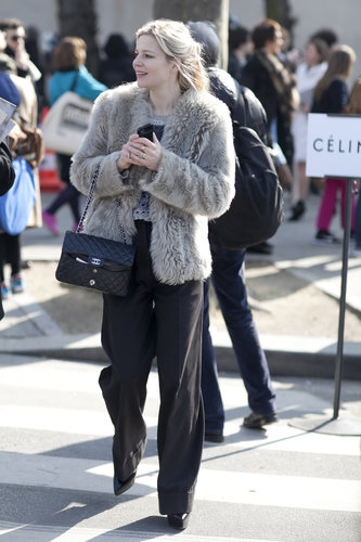 A furry topper offset classic, wide-leg trousers.
A furry topper offset classic, wide-leg trousers.