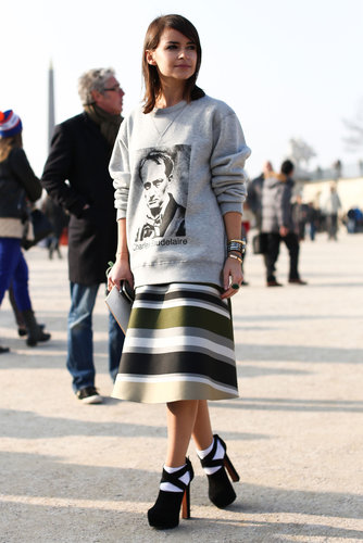 Miroslava Duma perfected sportif-chic in a sweatshirt, flared skirt, and platforms outside the shows.
Miroslava Duma perfected sportif-chic in a sweatshirt, flared skirt, and platforms outside the shows.
