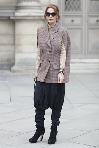 A menswear take that got a shot of street cool with harem pants and platform boots.
A menswear take that got a shot of street cool with harem pants and platform boots.