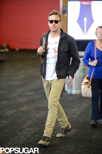 Ryan Gosling prepared to depart from LAX with Eva Mendes.
Ryan Gosling prepared to depart from LAX with Eva Mendes.