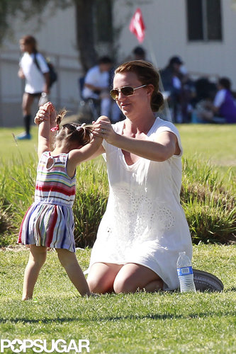 Britney Spears played with a friend's kid.
Britney Spears played with a friend's kid.