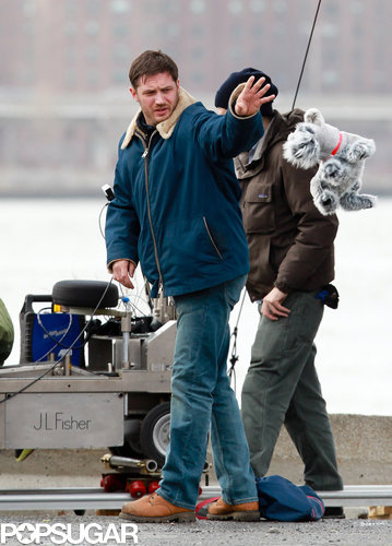 Tom Hardy Cuddles Up to a Canine Costar on Set Tom Hardy Cuddles Up to a Canine Costar on Set