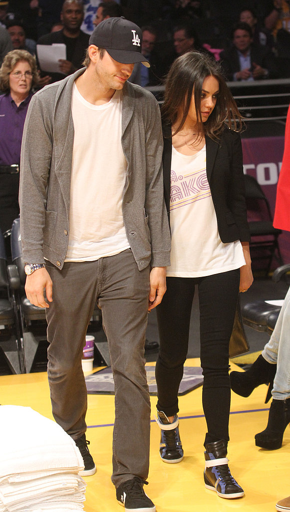 Mila Kunis cheered on the Lakers in February in a team shirt, black skinnies, and high-top sneakers — a classic, low-key game look.
Mila Kunis cheered on the Lakers in February in a team shirt, black skinnies, and high-top sneakers — a classic, low-key game look.