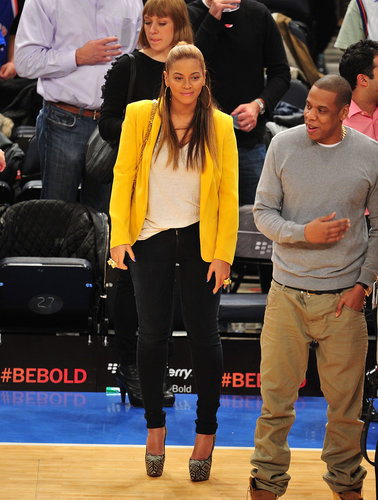 Beyoncé basically shows everyone how courtside glamour is done whenever she attends Brooklyn Nets games with her hubby (and part-owner of the team) Jay-Z. For a February 2012 game against the NY Knicks, Bey stepped out in black skinnies and a slouchy white tee, which she paired with a bright yellow Rag & Bone blazer and sky-high Christian Louboutin pumps.
Beyoncé basically shows everyone how courtside glamour is done whenever she attends Brooklyn Nets games with her hubby (and part-owner of the team) Jay-Z. For a February 2012 game against the NY Knicks, Bey stepped out in black skinnies and a slouchy white tee, which she paired with a bright yellow Rag & Bone blazer and sky-high Christian Louboutin pumps.