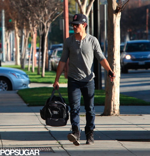Taylor Lautner wore a baseball hat.
Taylor Lautner wore a baseball hat.