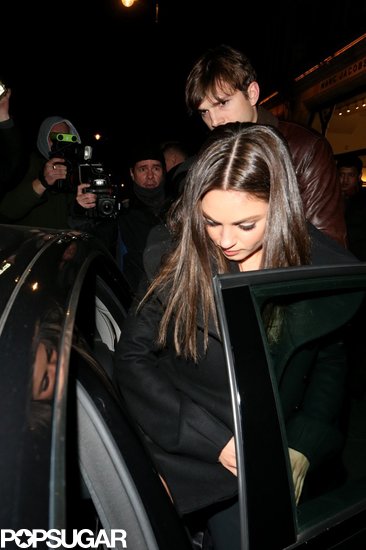 Ashton Kutcher helped Mila Kunis into the car after a dinner date in London.
Ashton Kutcher helped Mila Kunis into the car after a dinner date in London.