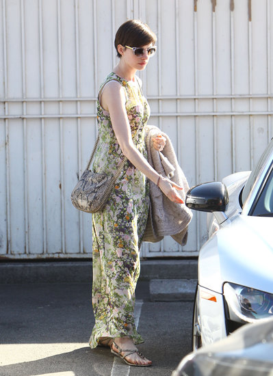 On a sunny day out in LA, Anne Hathaway showed off an adorable Spring look. She mixed prints via her Madewell floral maxi dress and a python-print Stella McCartney crossbody bag ($1,200), then finished off with flat sandals and clear sunglasses.
On a sunny day out in LA, Anne Hathaway showed off an adorable Spring look. She mixed prints via her Madewell floral maxi dress and a python-print Stella McCartney crossbody bag ($1,200), then finished off with flat sandals and clear sunglasses.